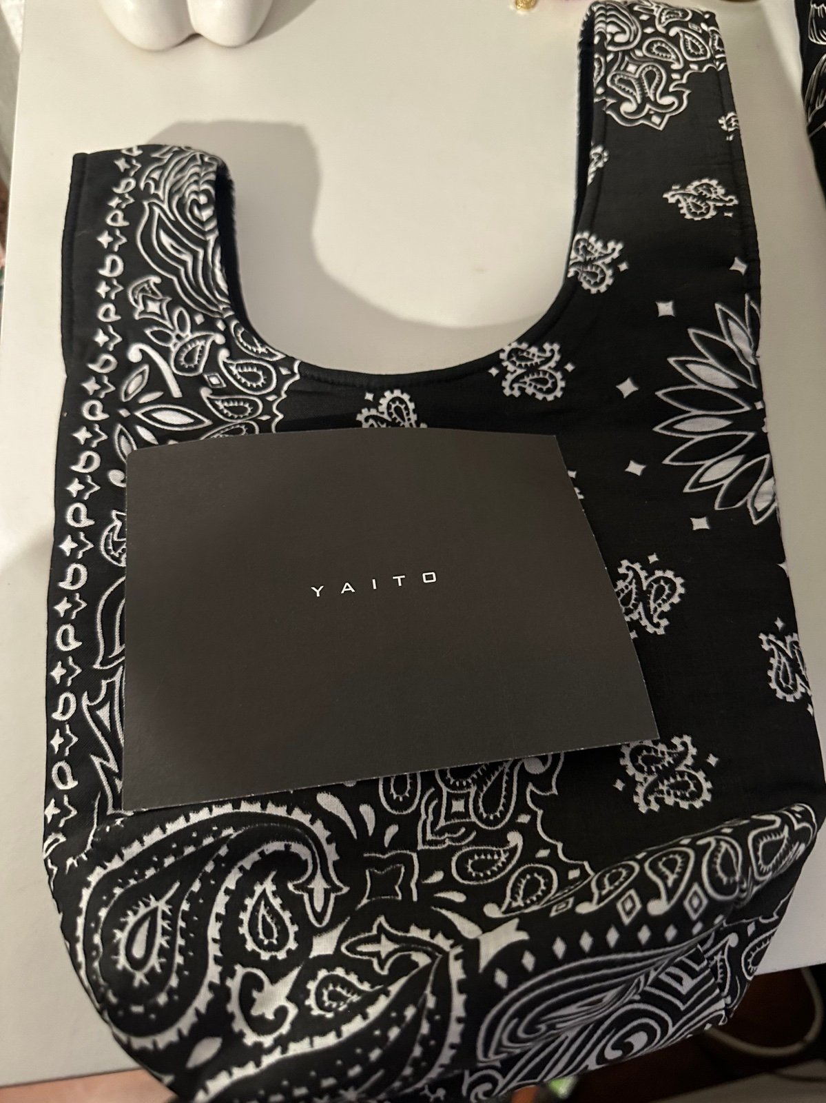 Yaito black paisley knot bag