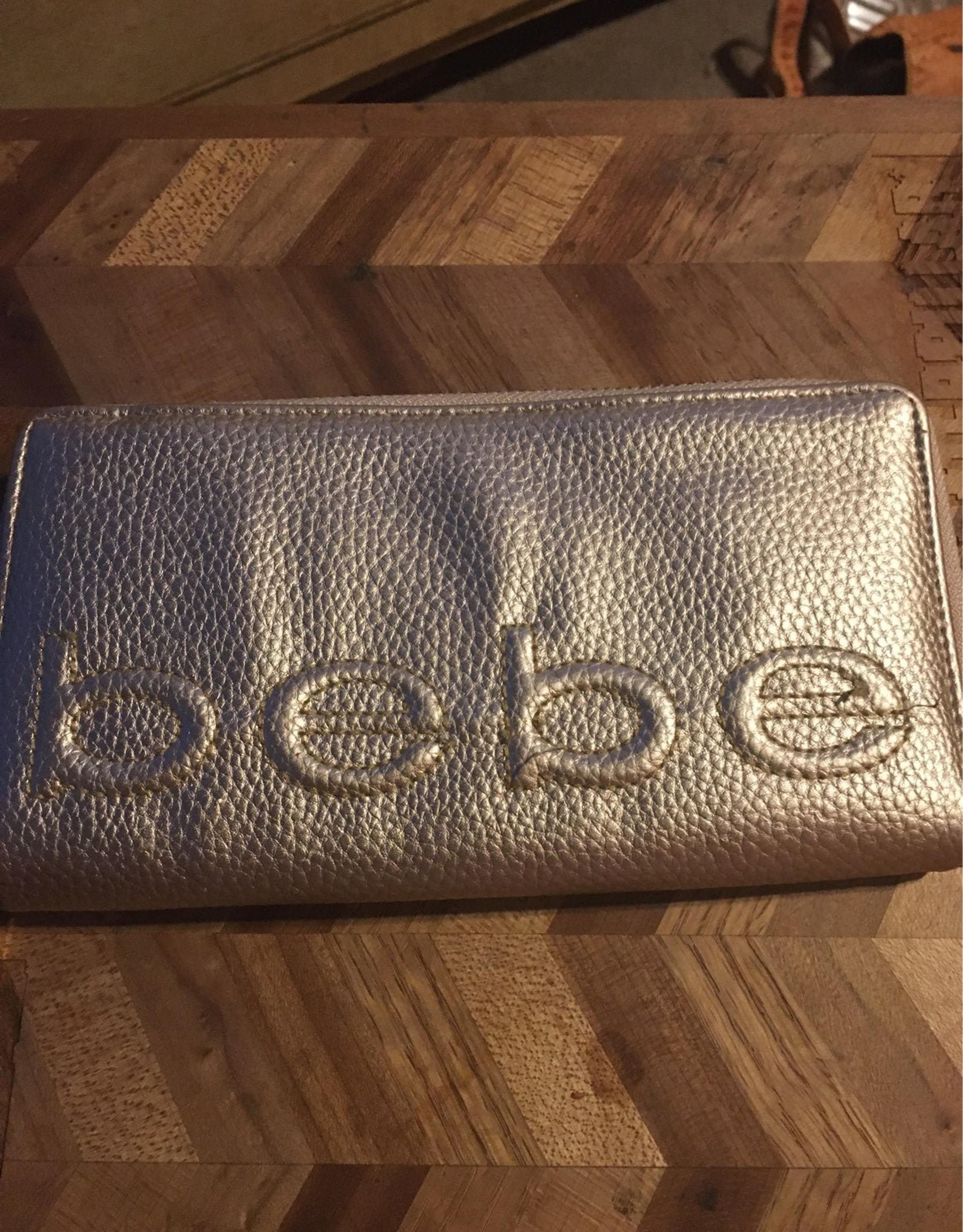 Bebe gold wallets for women
