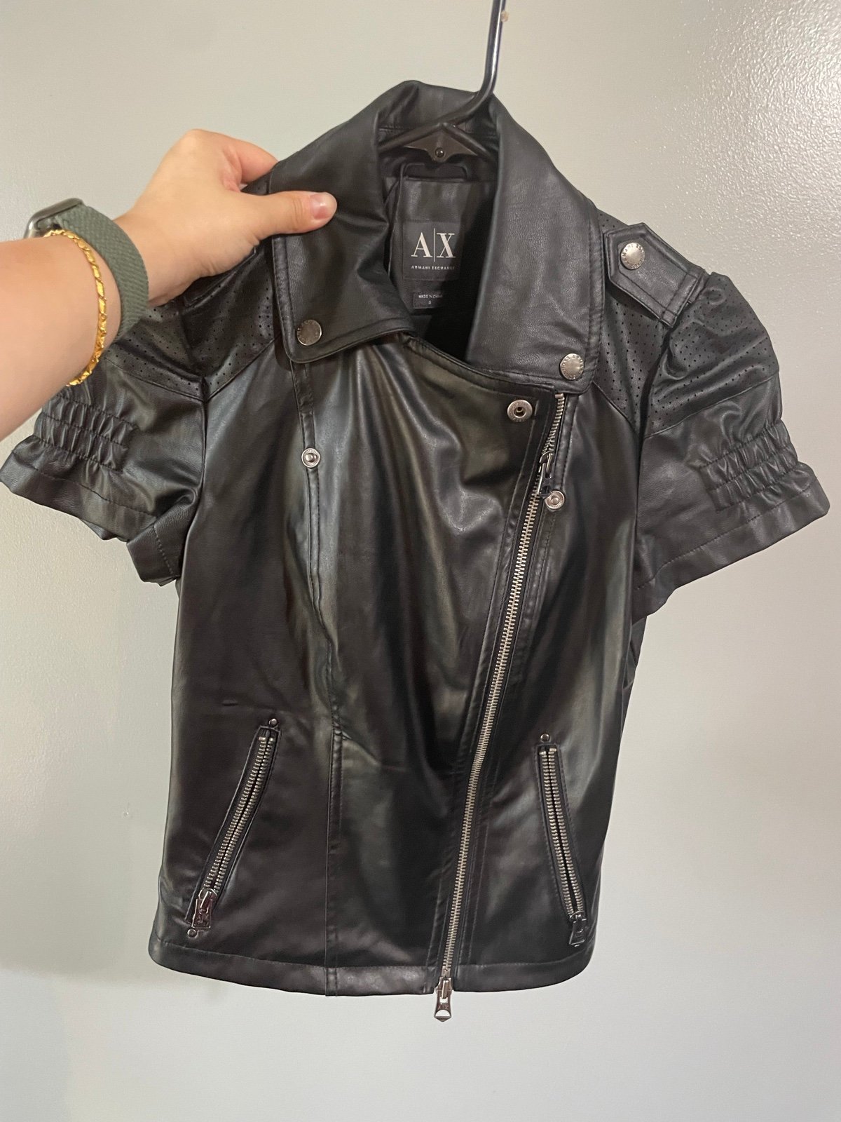 Gently worn A/X man made leather short sleeve motor jacket size S