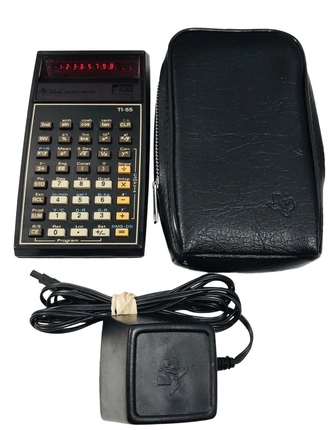 Vintage TI-55 calculator with adapter