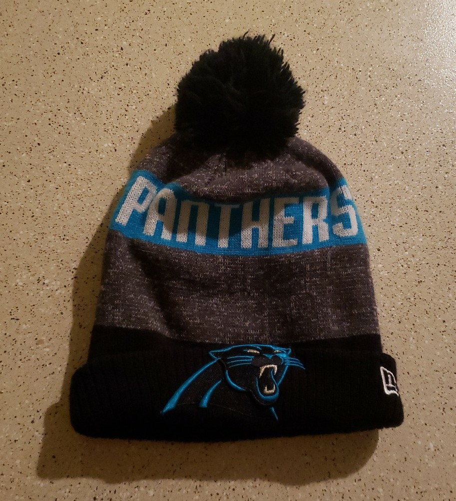 PANTHERS BEANIE (NEW ERA)