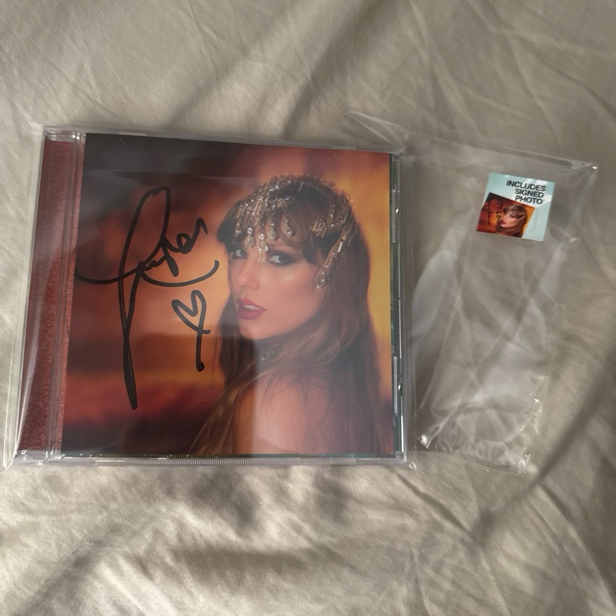 taylor swift life of a showgirl cd with signed photo #1 - long/wonky signature