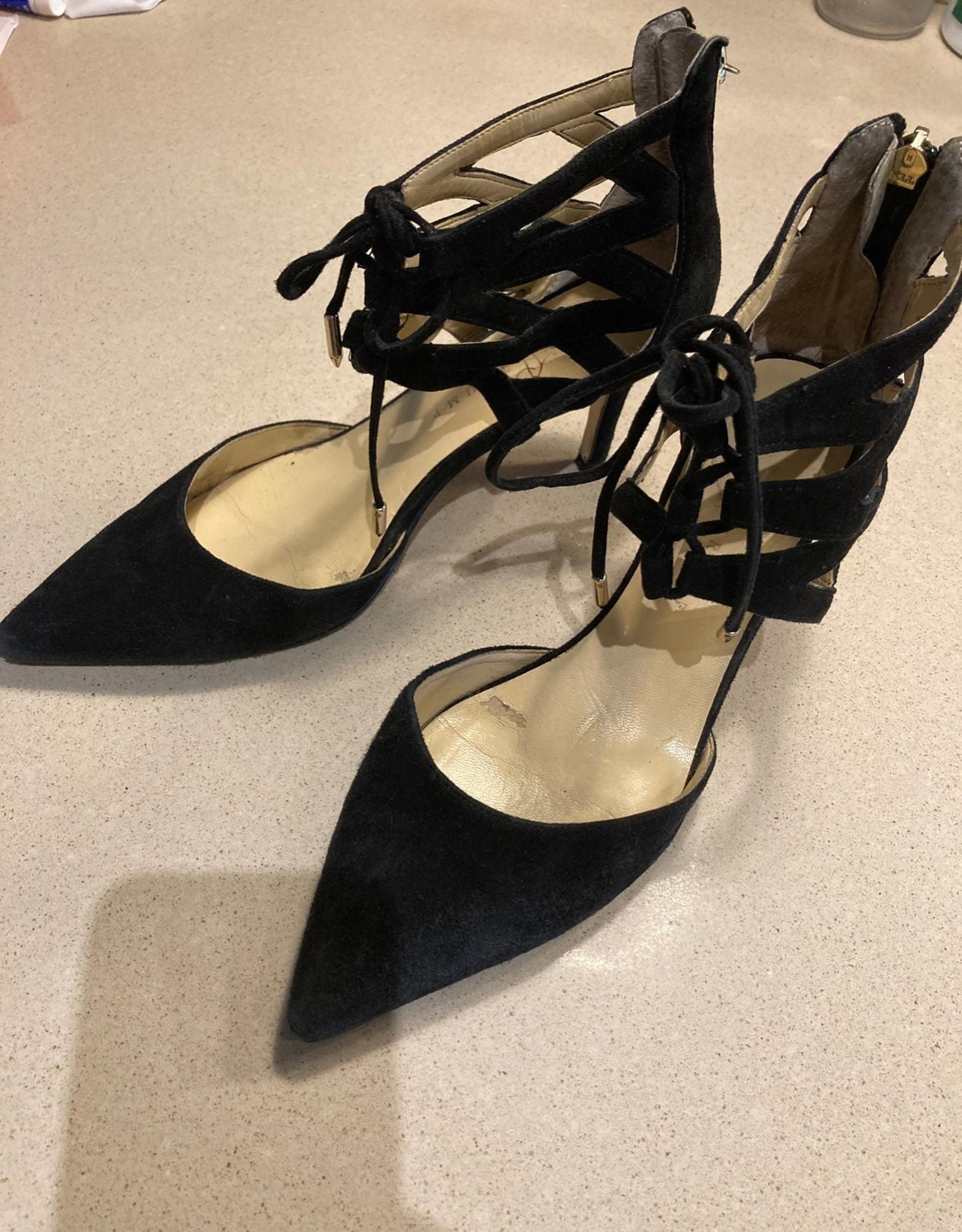 Black suede pumps