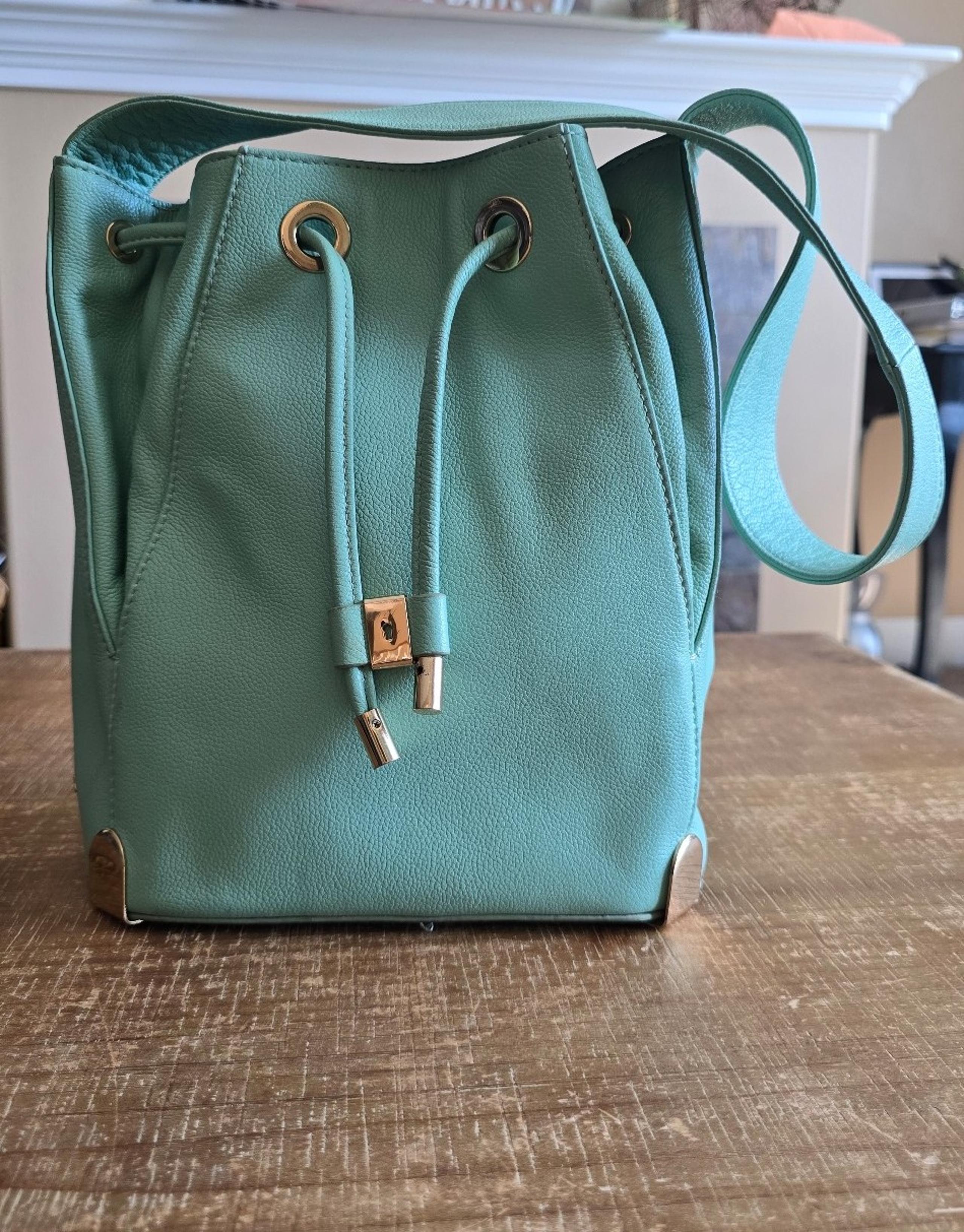 Vince Camuto mint green bucket purse with pocket and drawstring