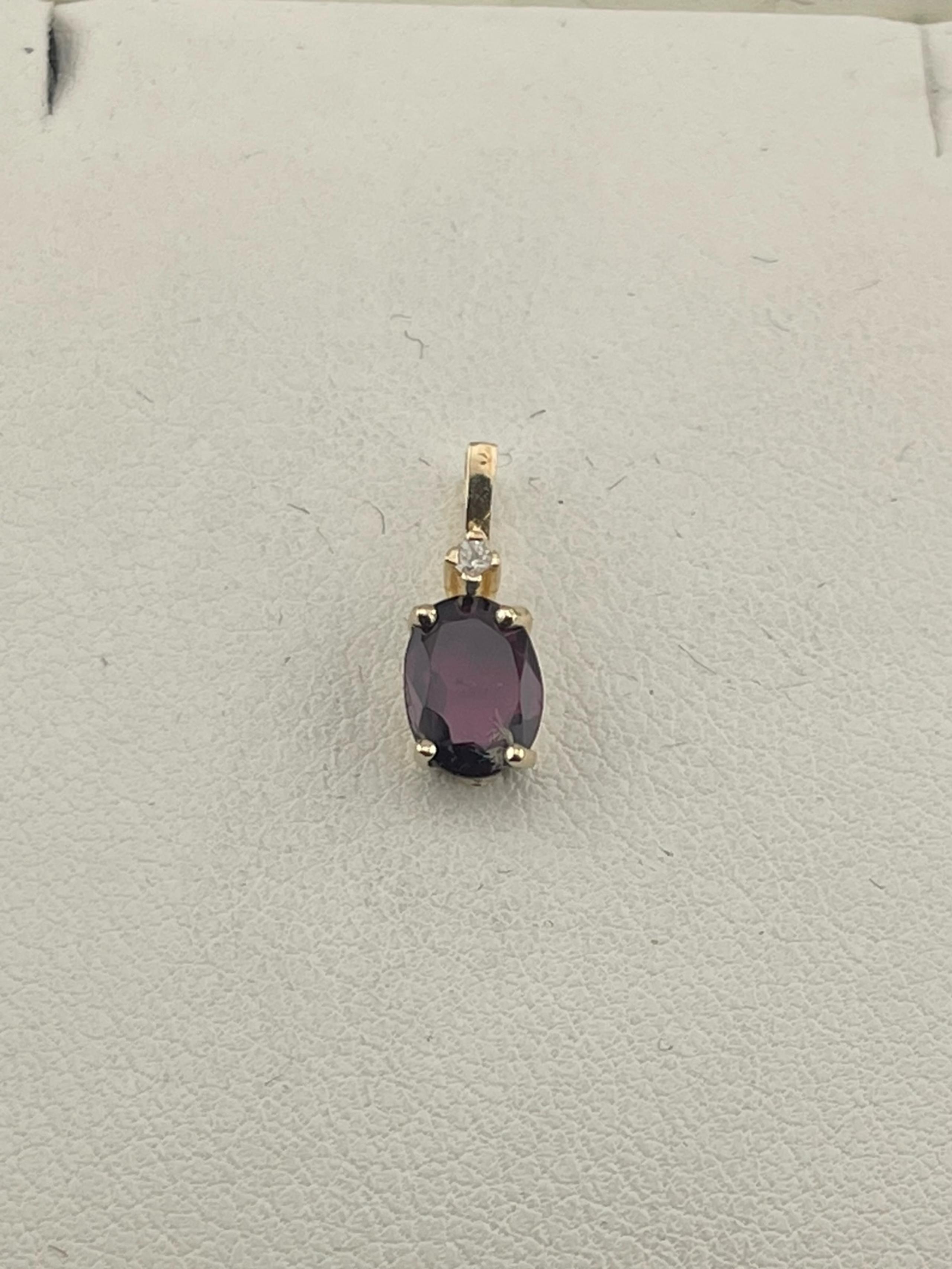 Vintage natural 1/2 carat ruby and diamond pendant 14 karat yellow gold