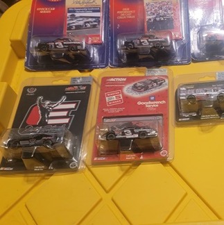 Dale Earnhardt lot of 7 diecast 1 flashlight car and 1 skateboard