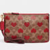 NWT COACH Small Wristlet In Signature Canvas Heart Print Gold Accents AUTHENTIC