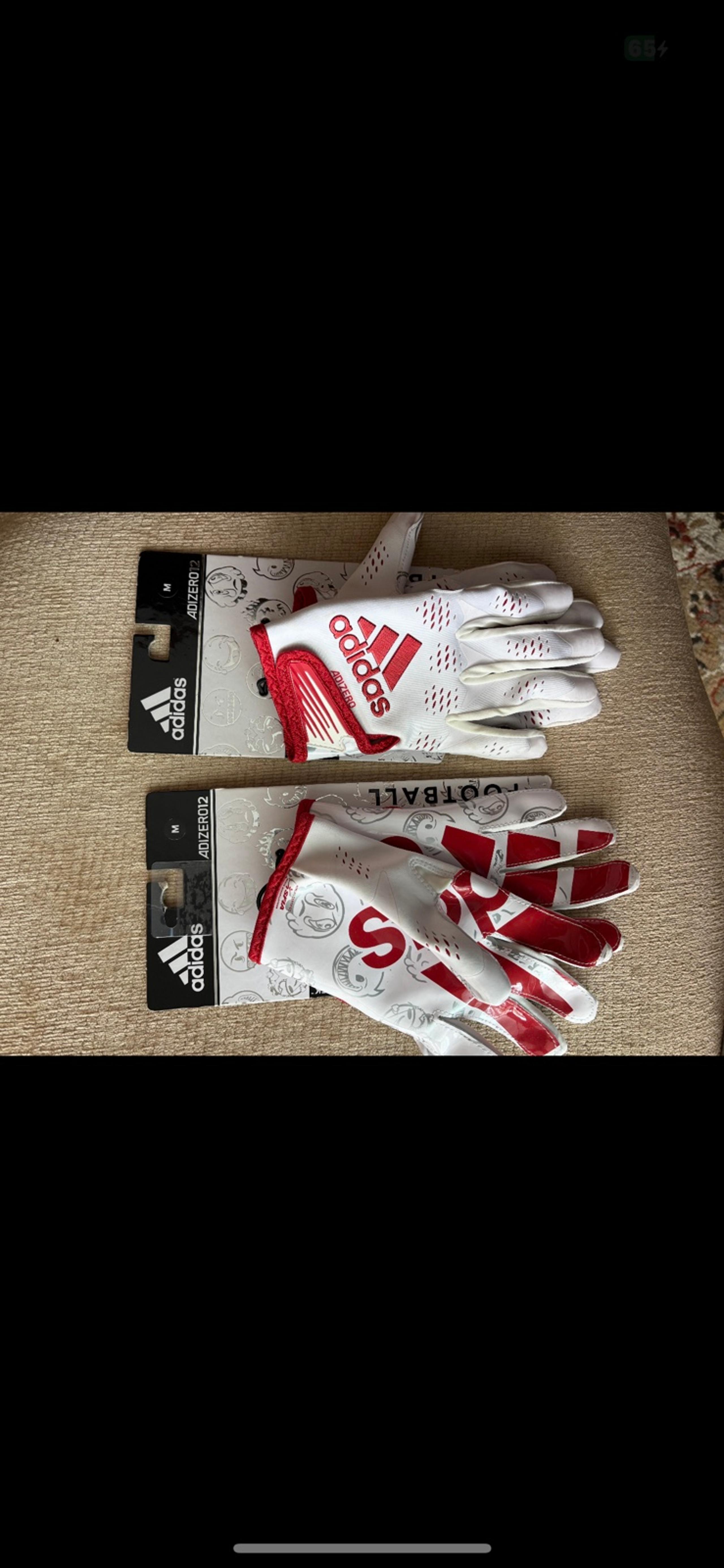 New football gear lot adult back plate and medium gloves