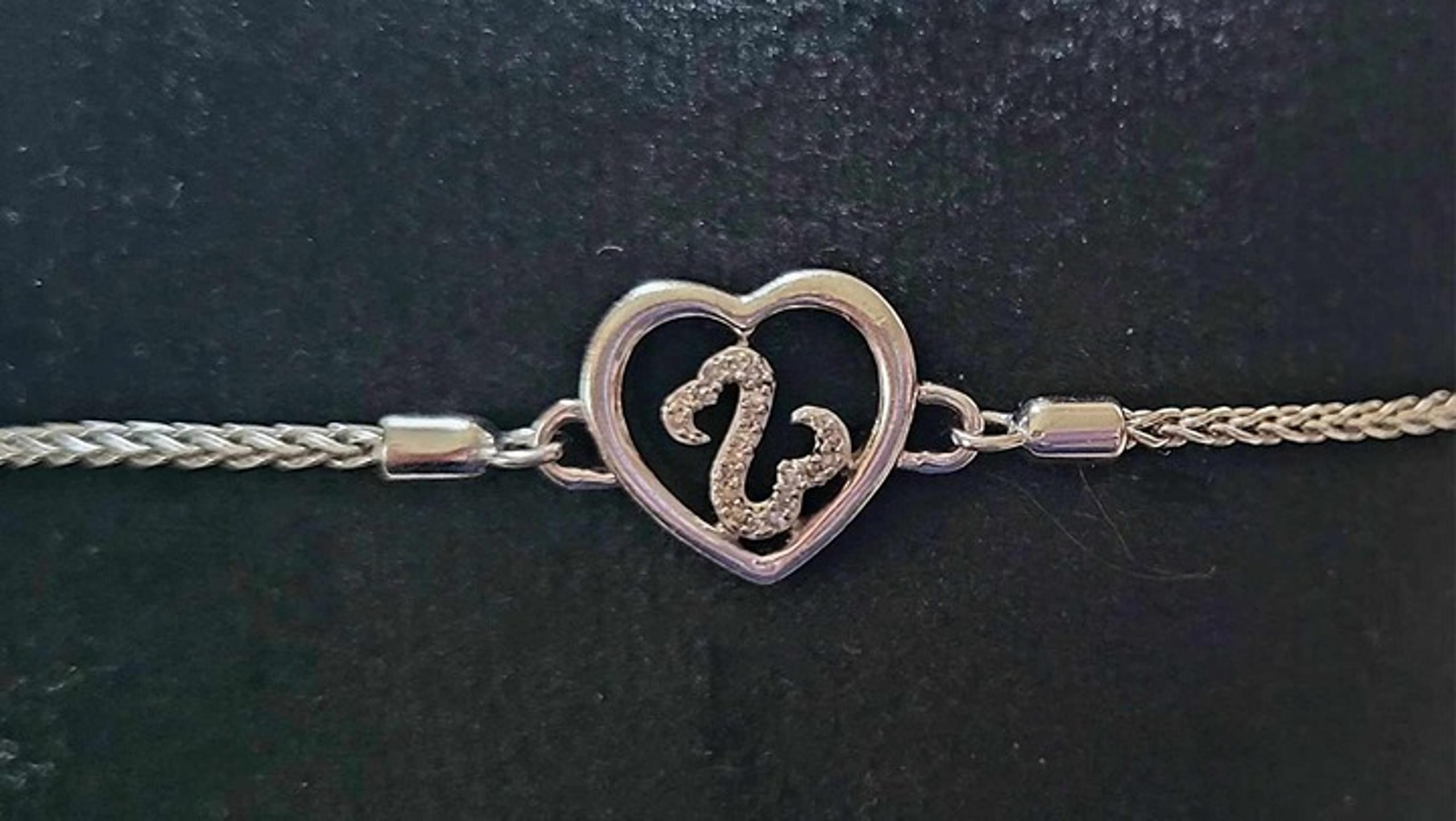 Open Hearts by Jane Seymour 1/20 CT. T.W. Diamond Heart Frame Bolo Bracelet