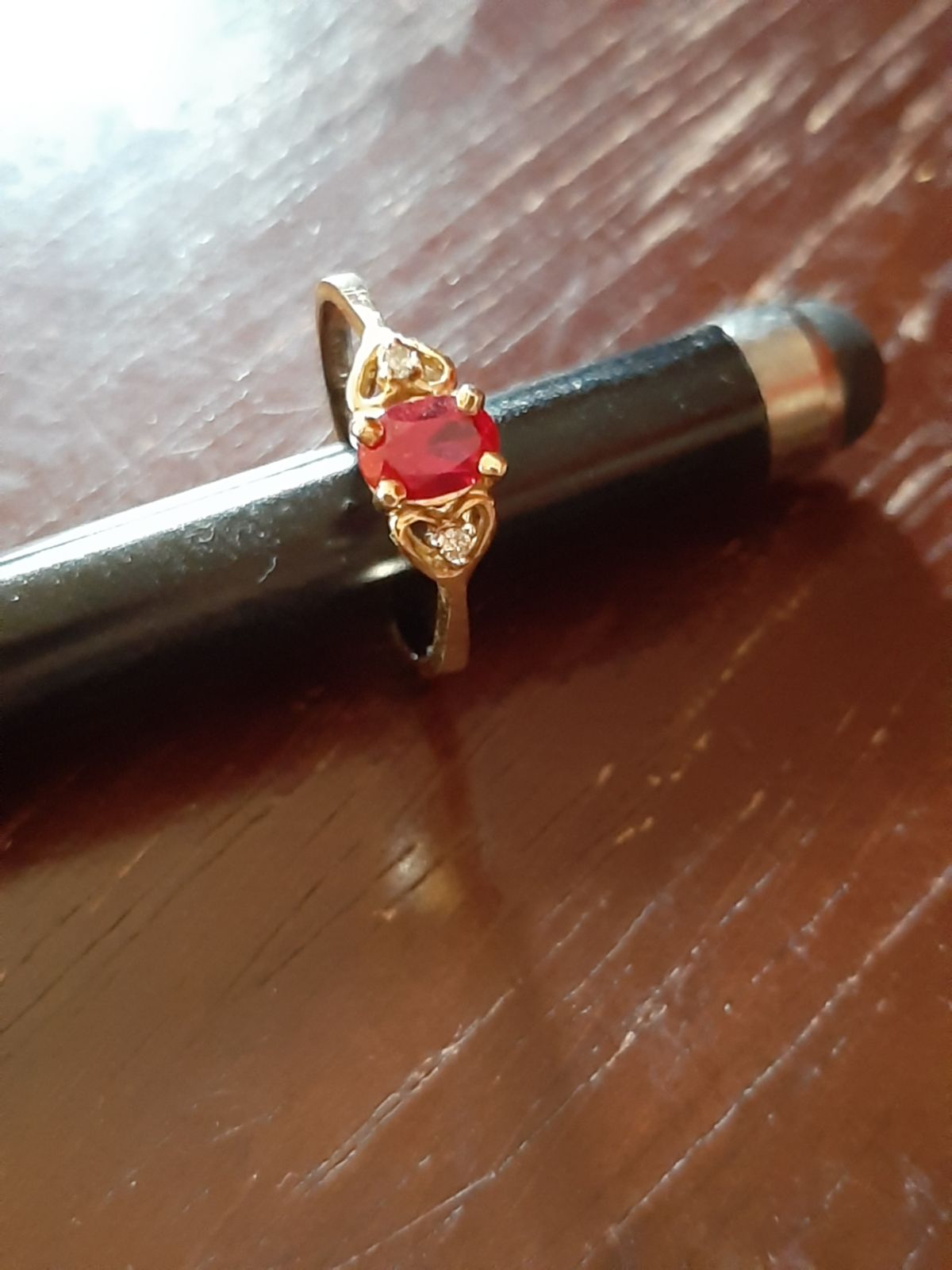 Lady's garnet and diamond 10k gold ring