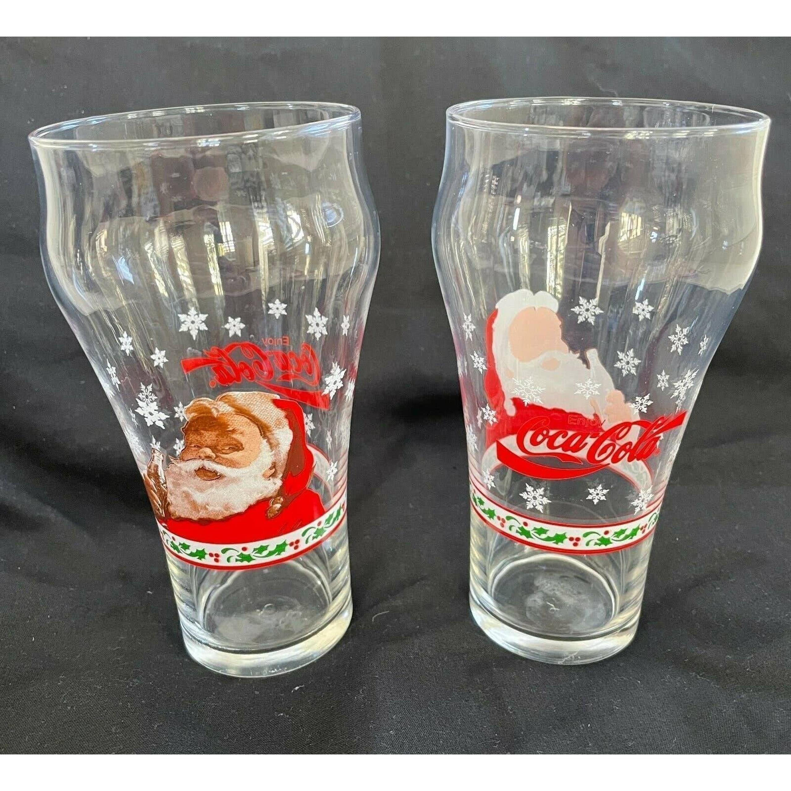 2 Vintage Enjoy Coca-Cola Christmas Santa Clause Glasses Snowflakes and Holly