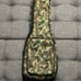 Standard size Breedlove ukulele. Kala capo. Nylon strings. Camo bag.