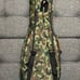 Standard size Breedlove ukulele. Kala capo. Nylon strings. Camo bag.