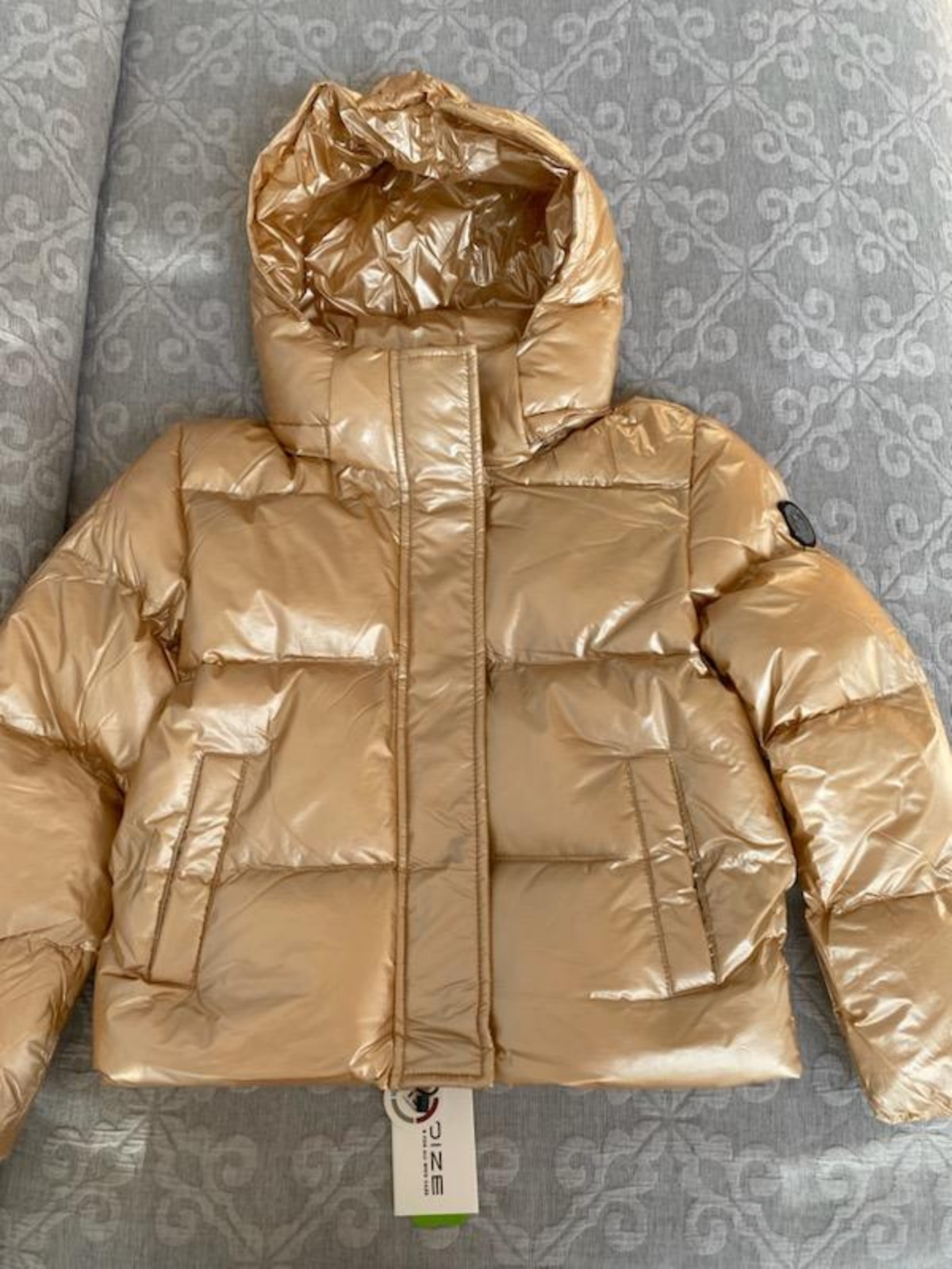 Girl's Noize Athena metallic puffer jacket.