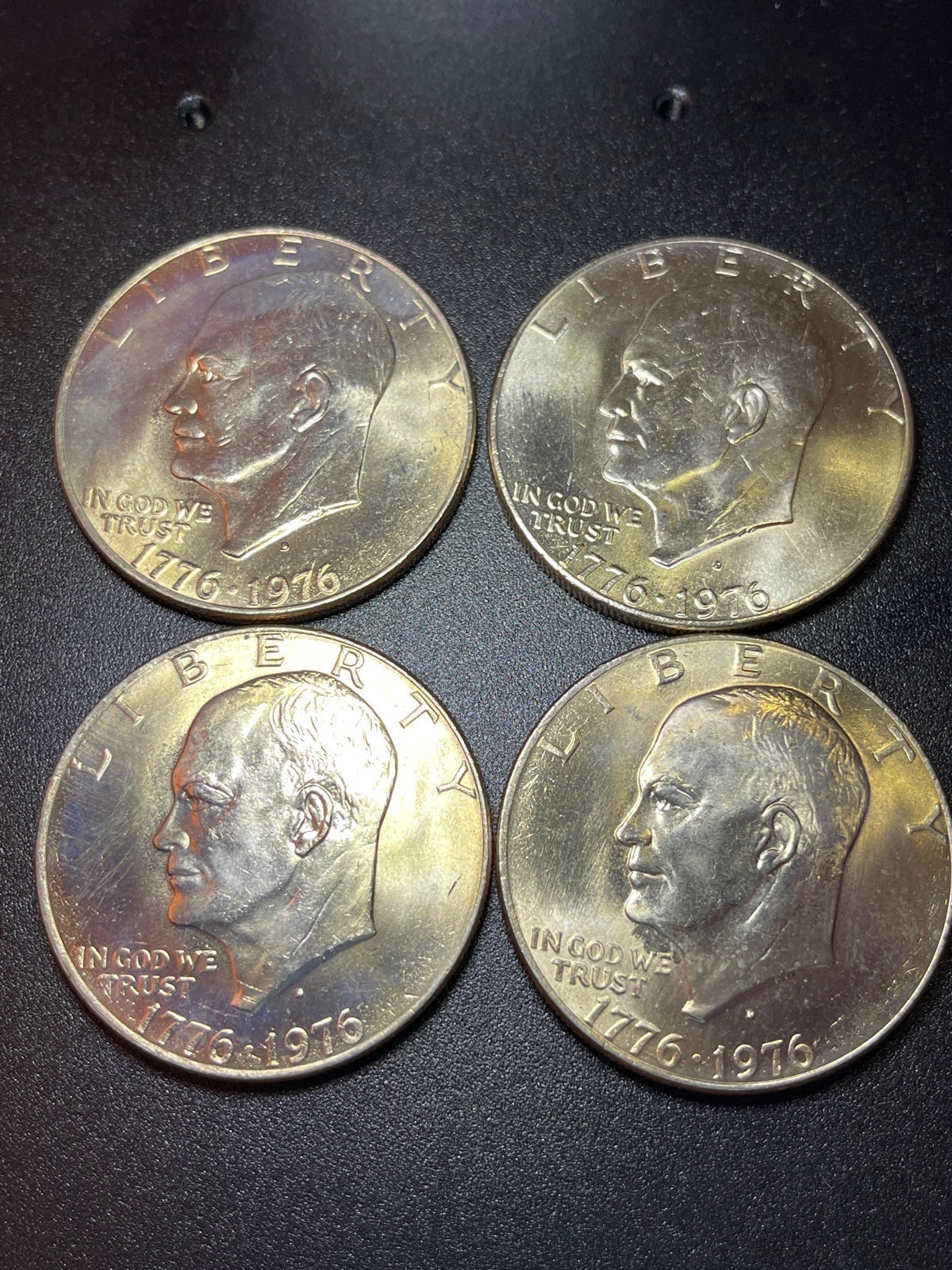 Lot of 4 (1 bicentennial Eisenhower dollars)