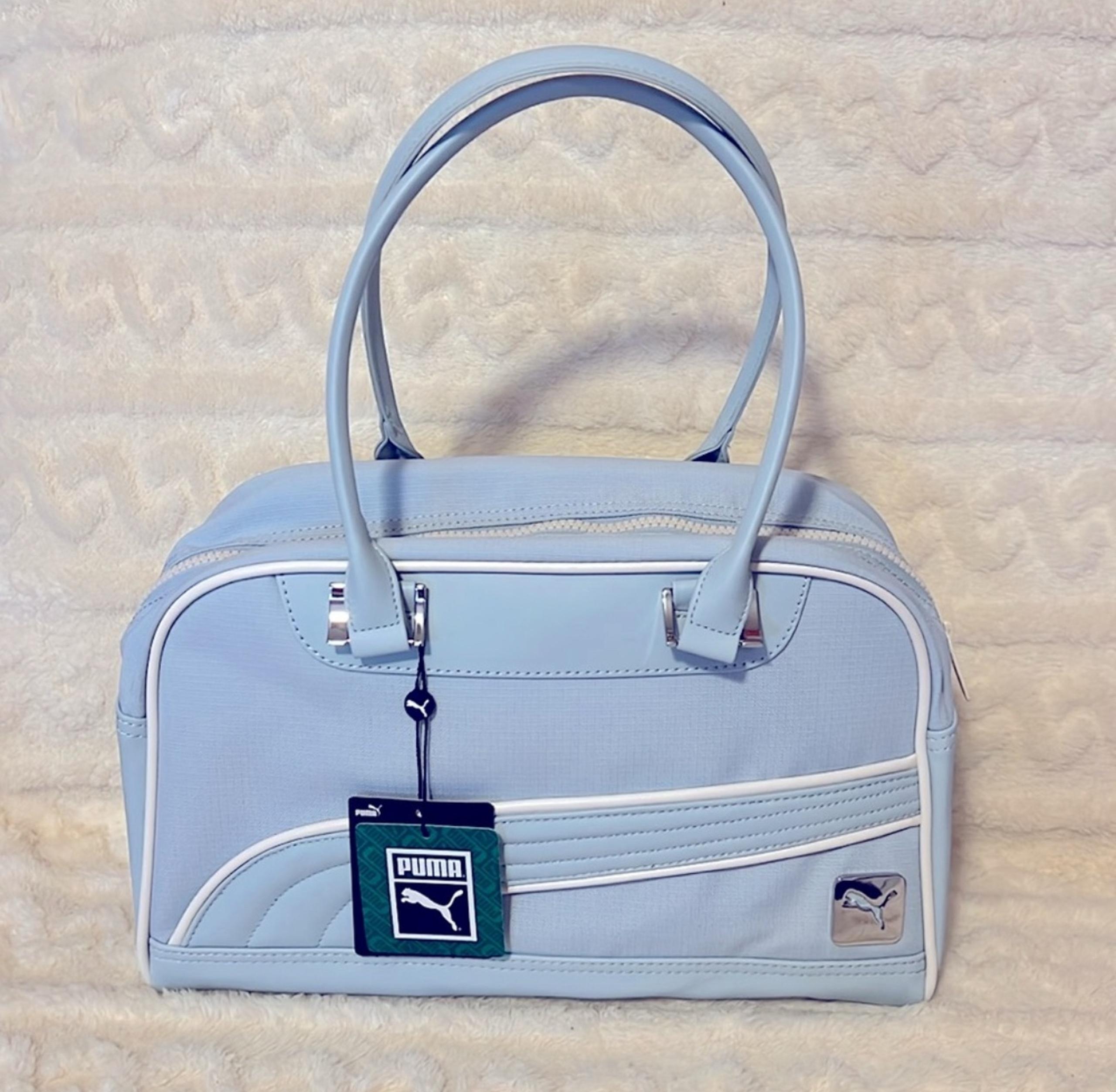 PUMA Women's Grip Shoulder Bag
Style: 857133_07 Light Blue Authentic Puma