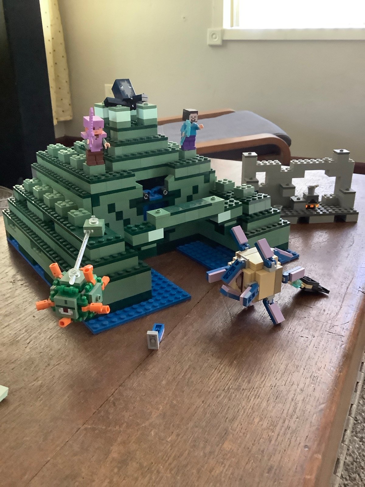 LEGO Ocean Monument 21136 retired with figurines and instruction manuals