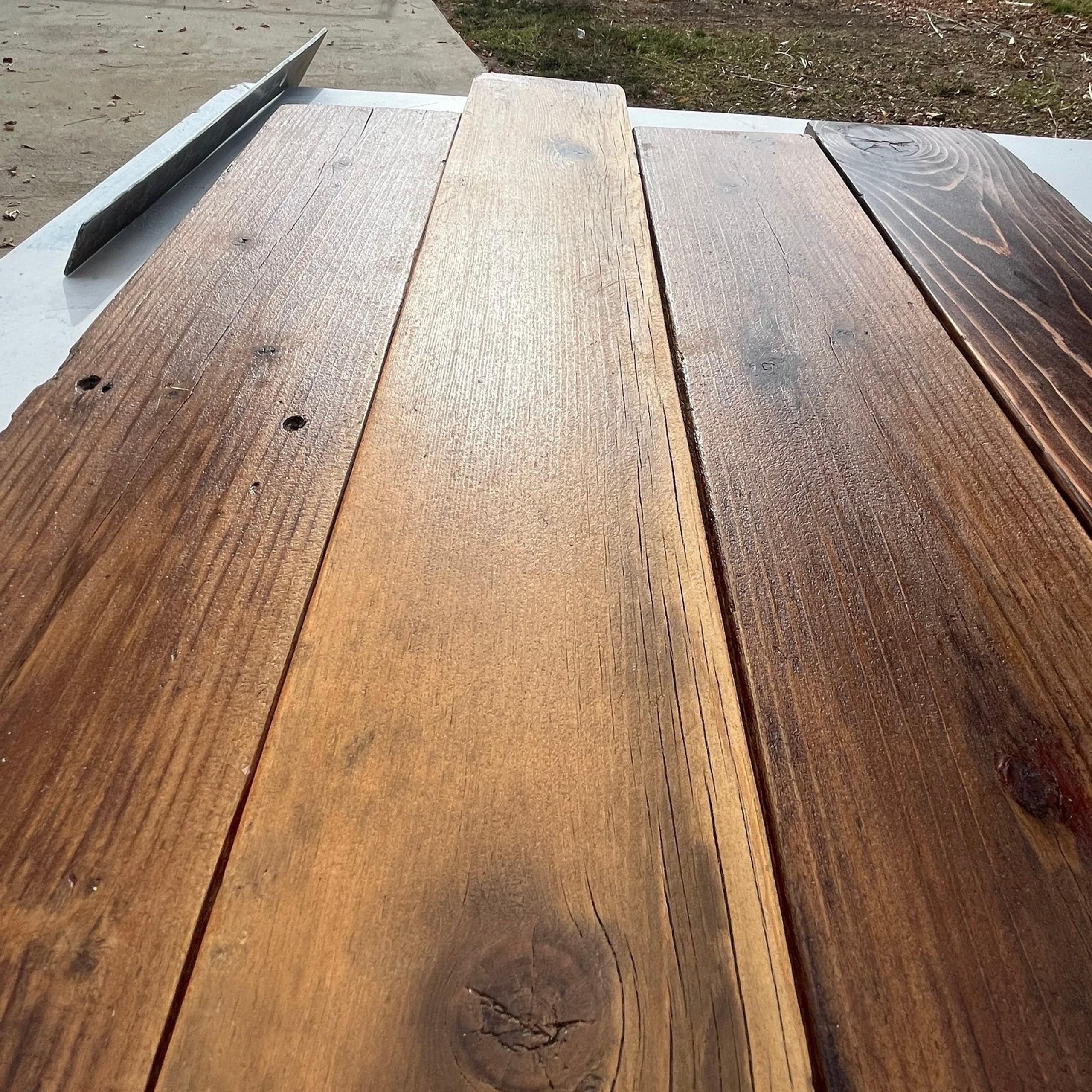 4 pieces of rustic reclaimed and finished barn wood urethane finish 25”-28”x 5”
