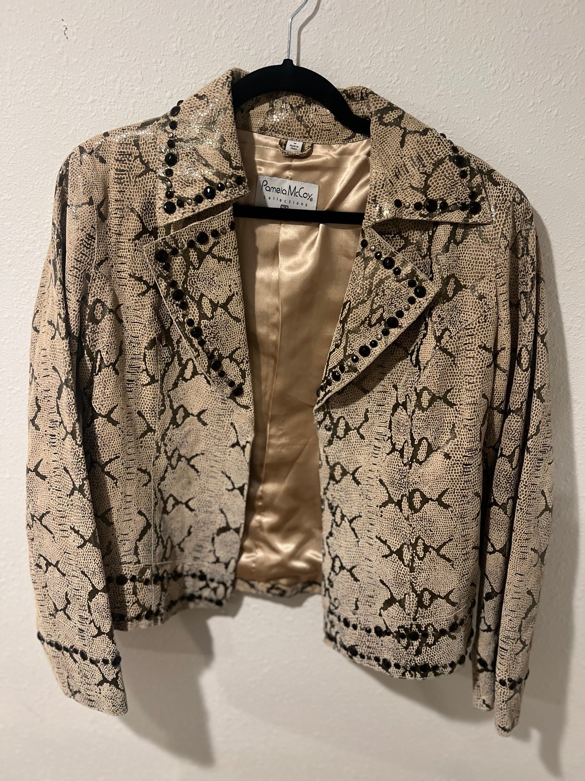 Pamela McCoy collection snakeskin leather jacket with embellishments