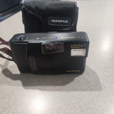 OLYMPUS infinity Jr Quartz Date