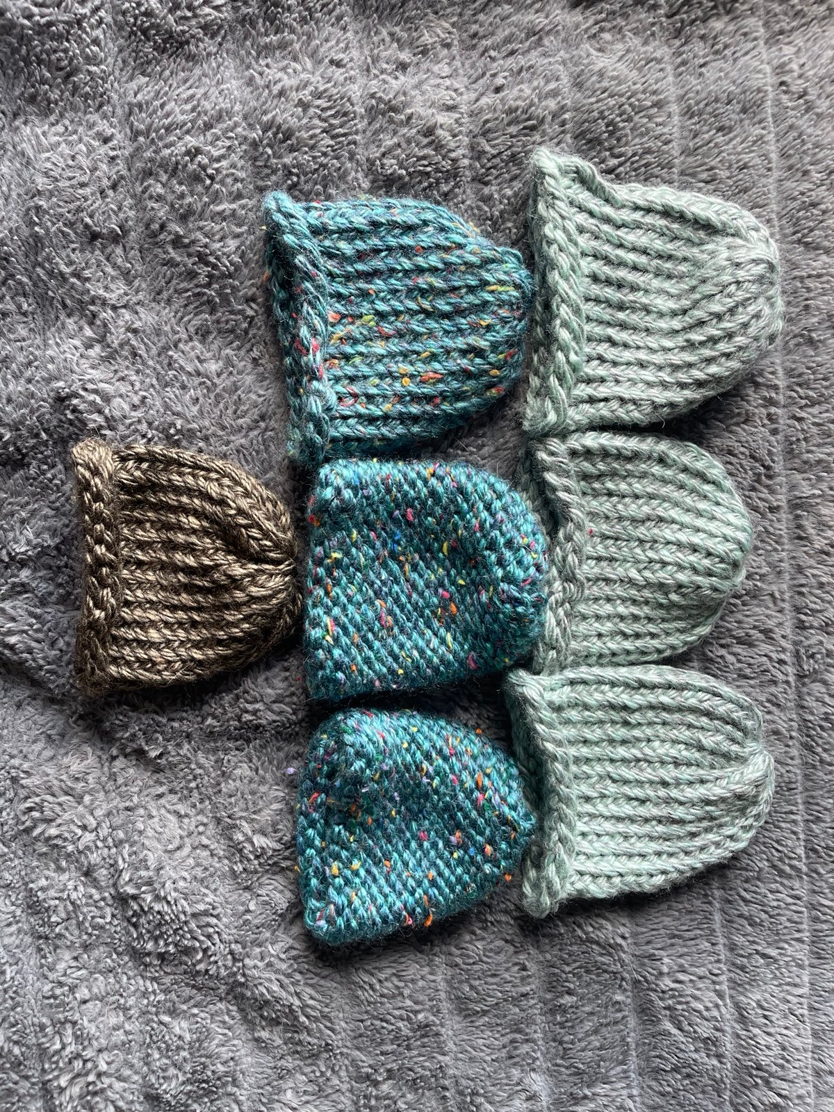 Loom knitted baby hats