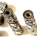 Vintage elephant carved horned beads. 386