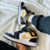 Air Jordan 1 Mid “Pollen / Black / White