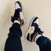 Air Jordan 1 Mid “Pollen / Black / White