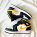 Air Jordan 1 Mid “Pollen / Black / White