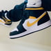 Air Jordan 1 Mid “Pollen / Black / White