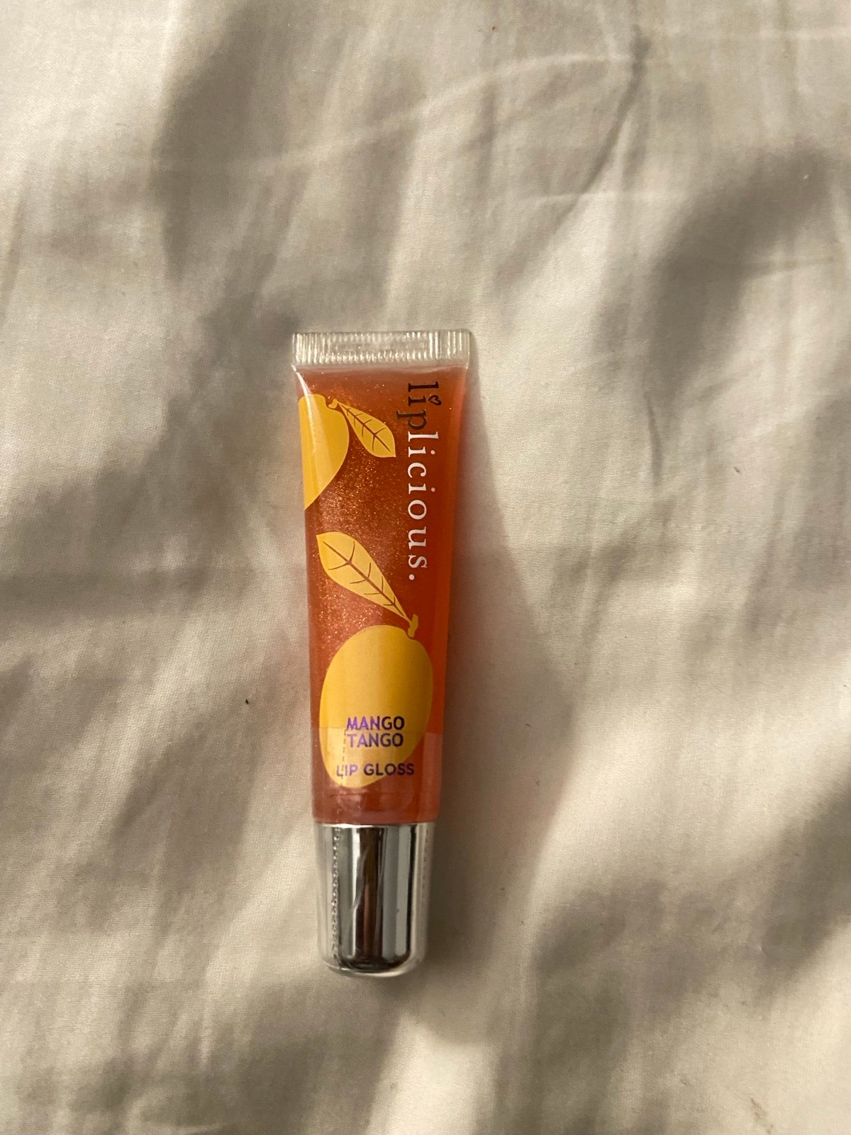 Liplicious mango tango lipgloss rare