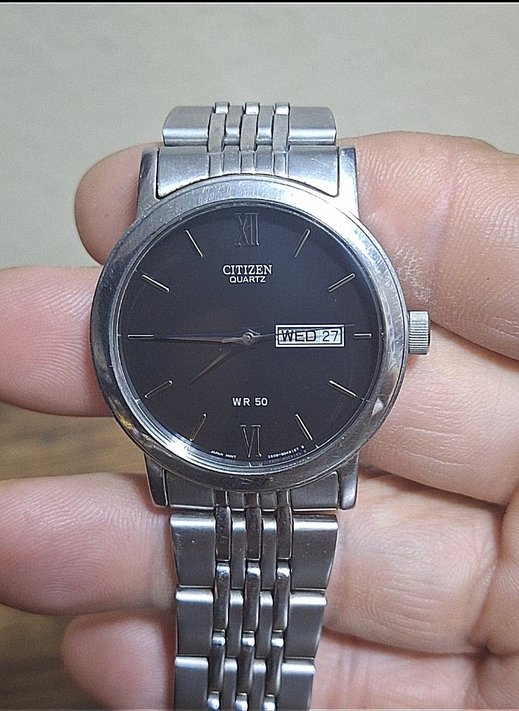 Elegant Citizen Silver Tone With Black Dial Stainless Steel Mens Quartz Watch.