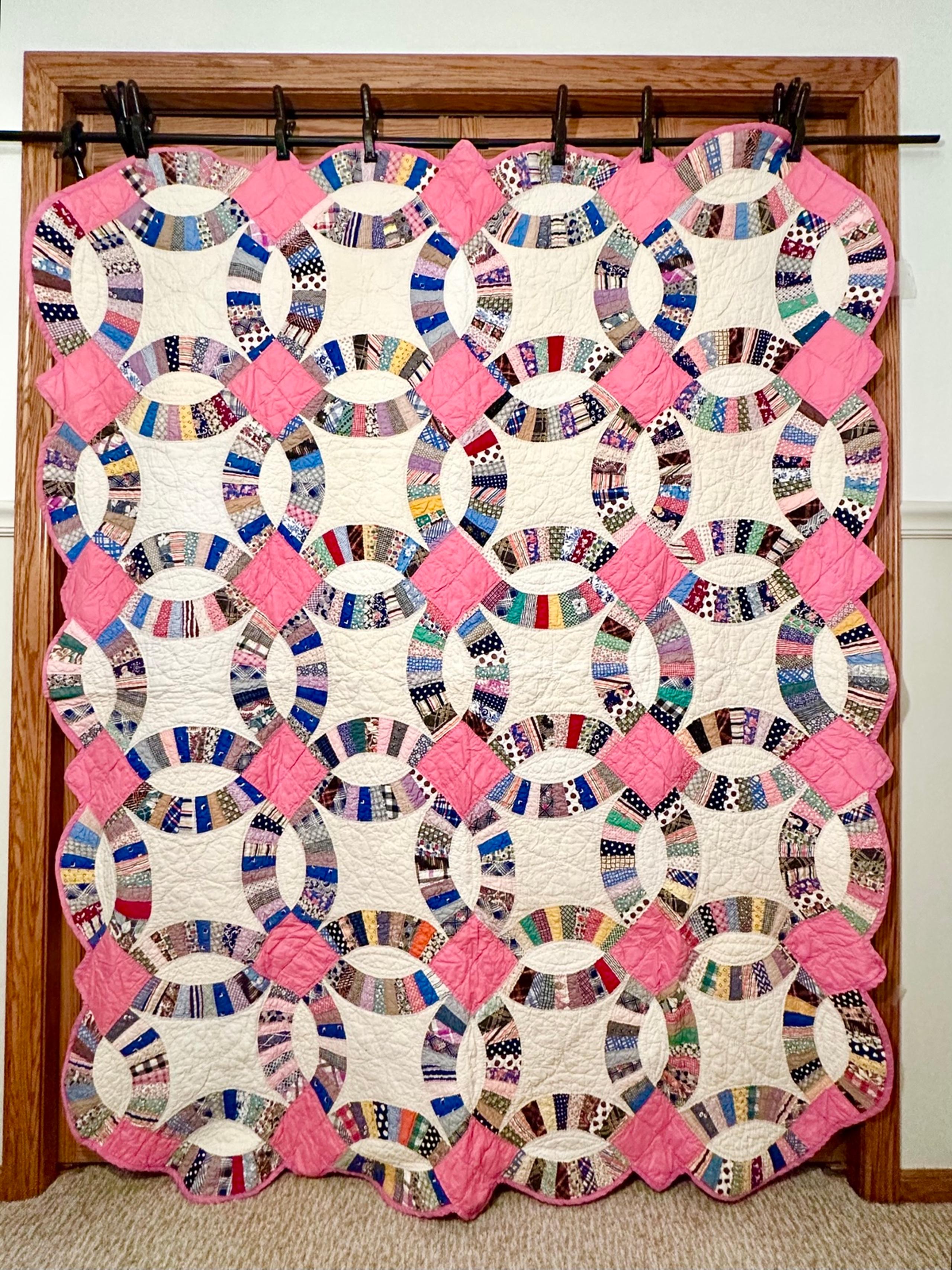 Handmade pink wedding ring quilt