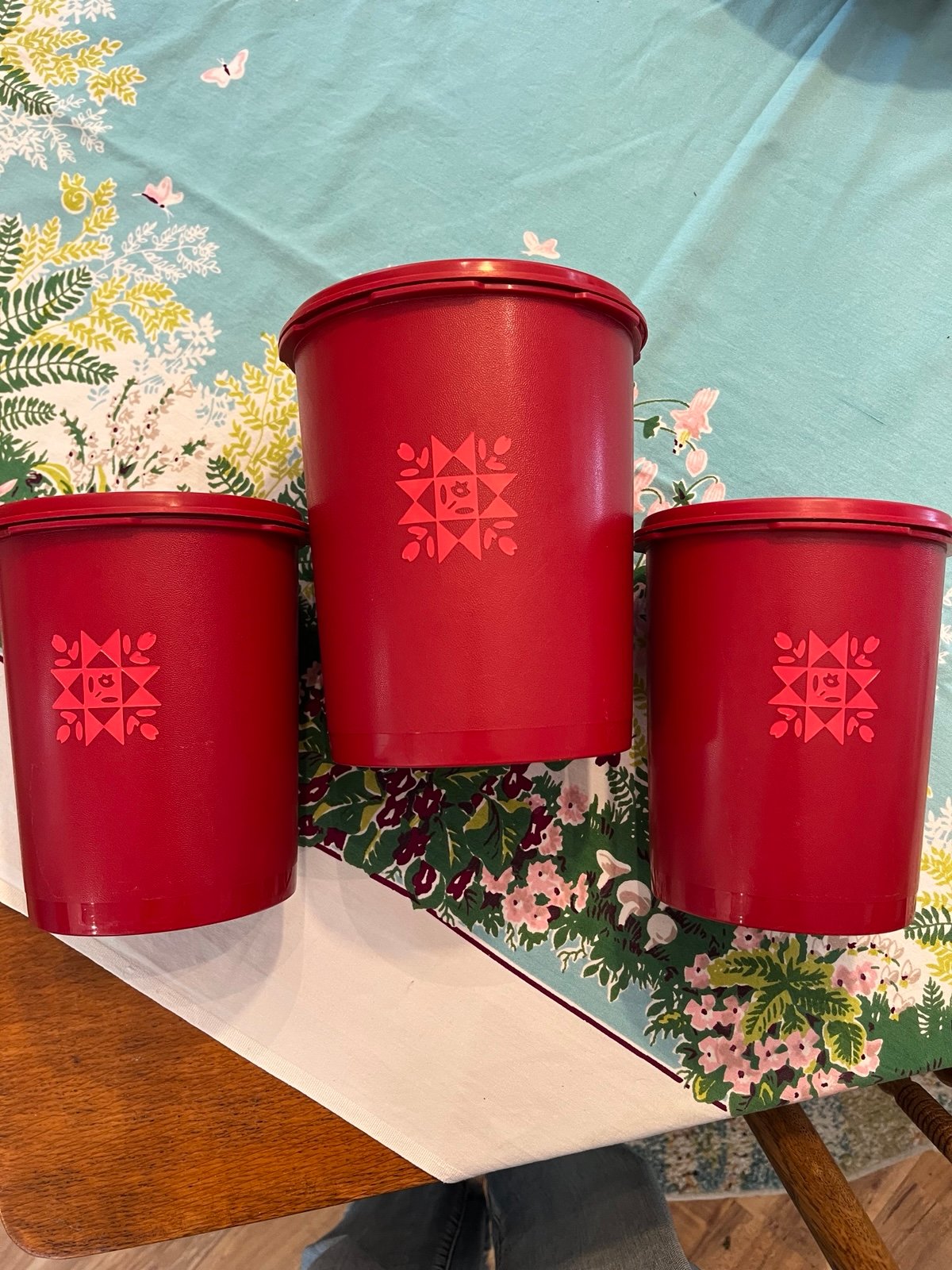 1970s vintage Tupperware three-piece canister set Red with pink quilt Pattern