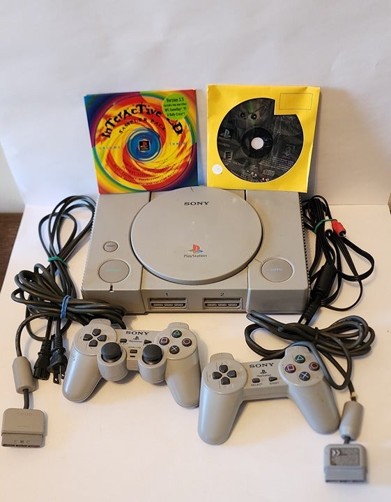 Sony Playstation w/ 2 Controllers, 2 Disc Bundle SCPH-7501