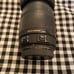 Sigma DC 18-250mm 1:3.5-6.3 HSM for Sony. Lens covers on both sides. Some wear