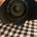 Sigma DC 18-250mm 1:3.5-6.3 HSM for Sony. Lens covers on both sides. Some wear