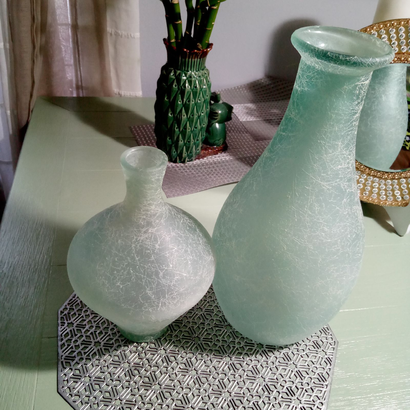 Two sets of vases