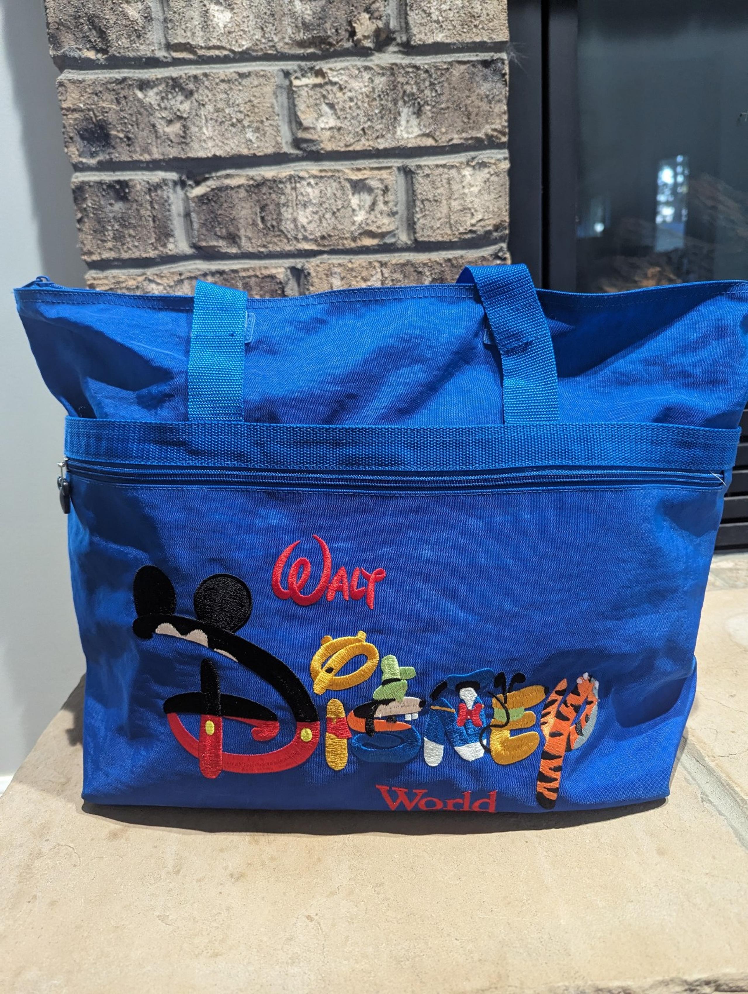 Vintage Walt Disney World Blue Embroidered Character Zip Top Nylon Tote Bag.