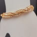 B307 Two Strand Criss Cross Champagne Tennis Bracelet. 7”.