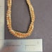 B307 Two Strand Criss Cross Champagne Tennis Bracelet. 7”.