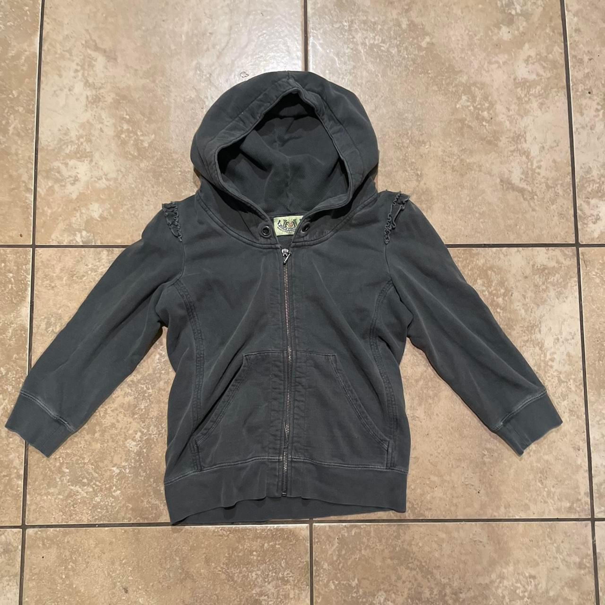 Black Juicy Couture zip-up hoodie measured estimate to be a women’s small.