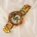 Women’s Gold Michael Kors clasp band style watch with tortoise shell details