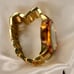 Women’s Gold Michael Kors clasp band style watch with tortoise shell details