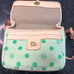 Dooney & Bourke green polka dot crossbody