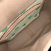 Dooney & Bourke green polka dot crossbody