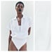 NWT. Zara White Poplin Short Sleeve Bodysuit with V-neck Lapel Collar. Size M.
