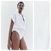 NWT. Zara White Poplin Short Sleeve Bodysuit with V-neck Lapel Collar. Size M.