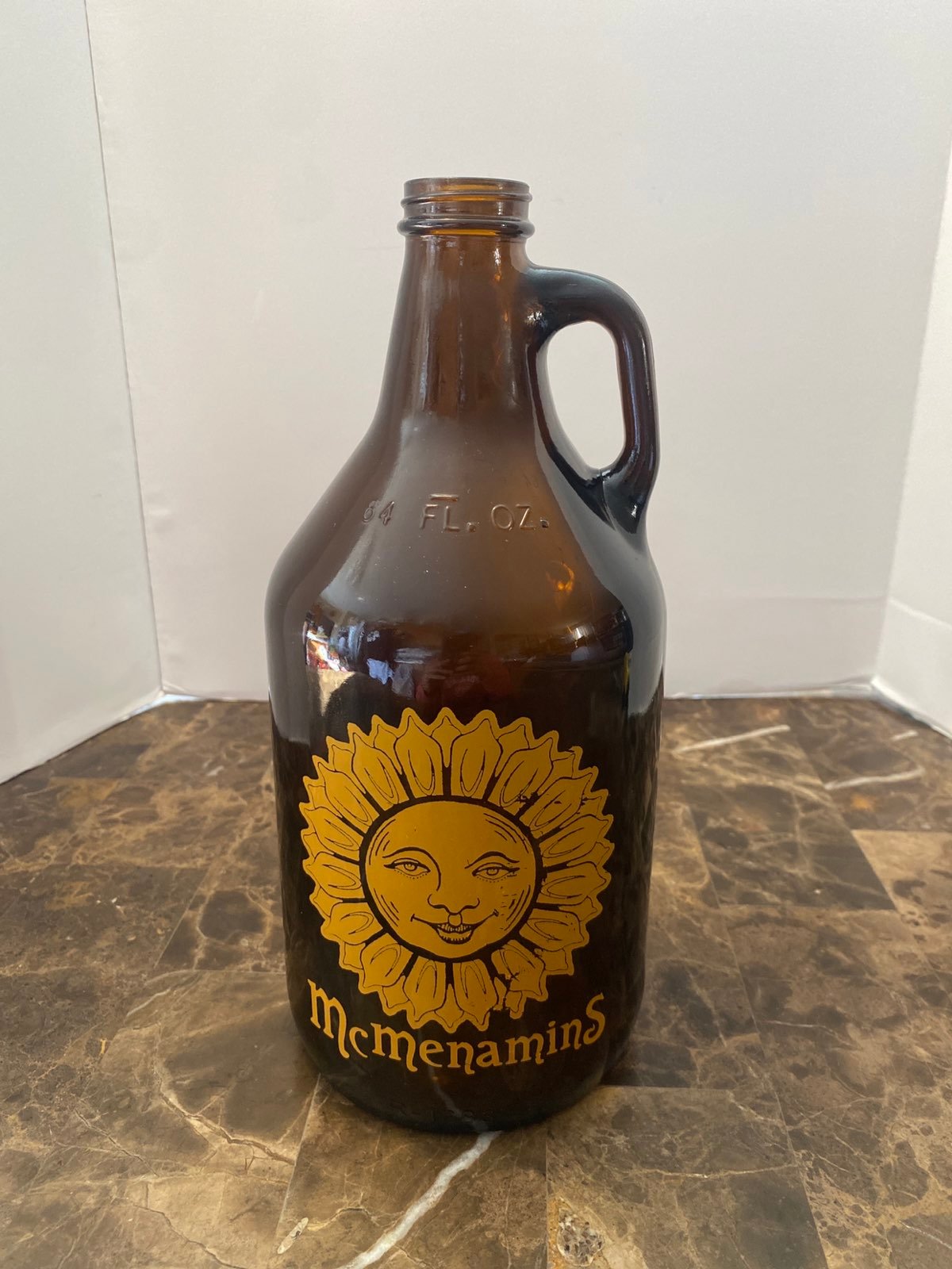 MCMENAMINS BREWERY BROWN EMPTY GLASS BOTTLE SUN STARS 64 FL OZ 11”