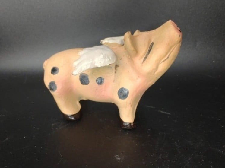 Vintage cast iron flying pig